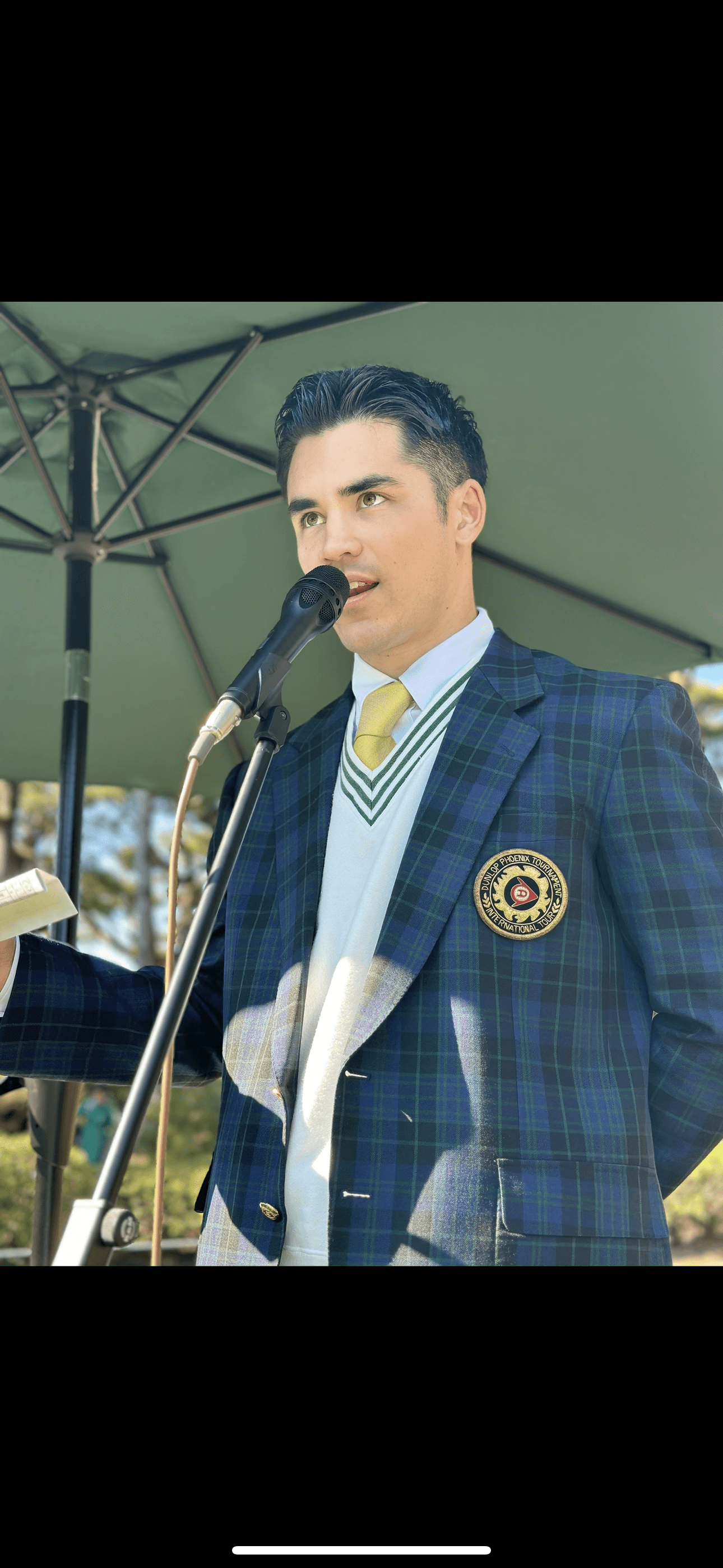 MC on stage at the Dunlop Phoenix tournament